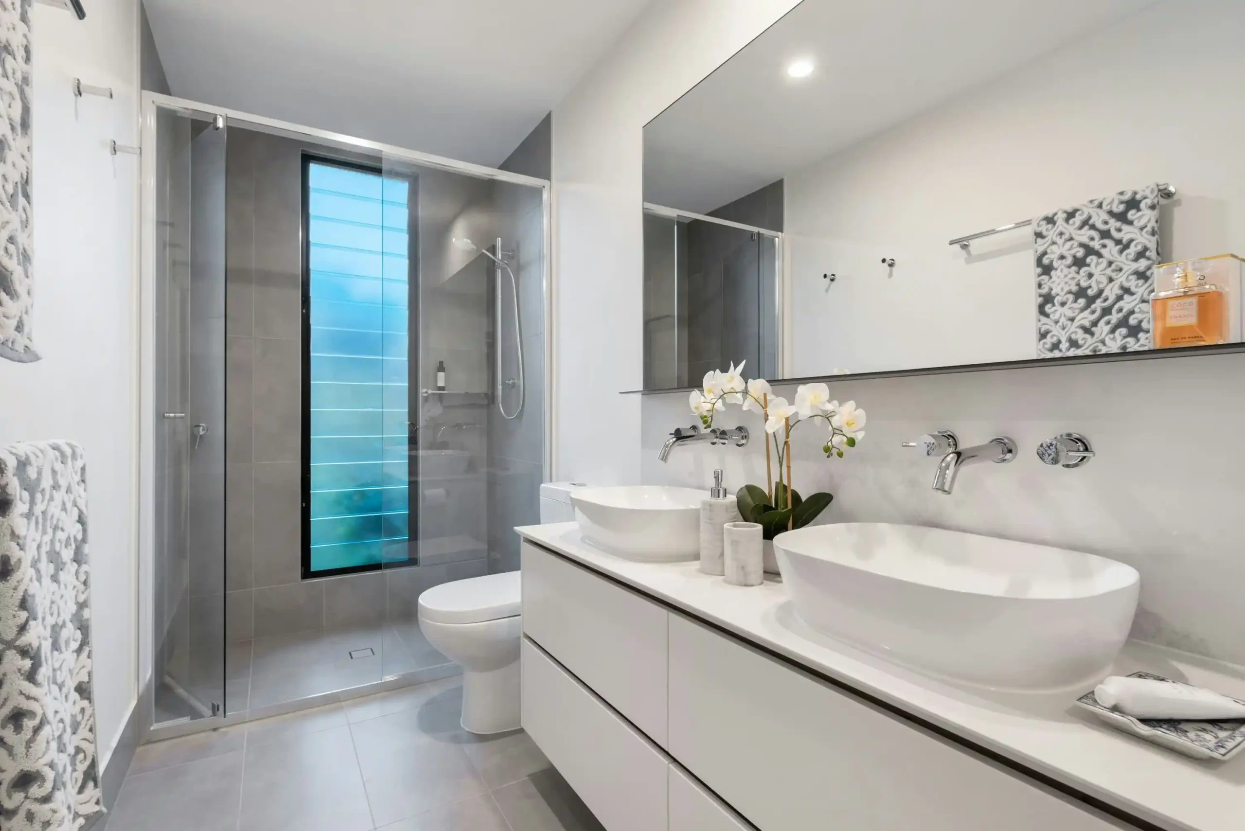 Completed bathroom renovation with double vanity and walk-in shower in Dublin